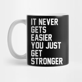 it never gets easier you get stronger Mug